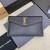 Pochette UPTOWN in pelle goffrata grain de poudre