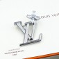LV Brooch