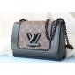 Lous Vuitton Twist MM in Epi leather