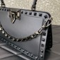 Valentino Garavani Rockstud handbag in calfskin.