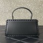 Valentino Garavani Rockstud handbag in calfskin.